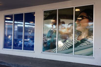 Perforated one way view vinyl, digital printed, optical clear lamination.